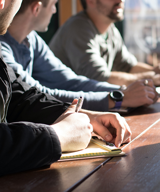 People at a table meeting.