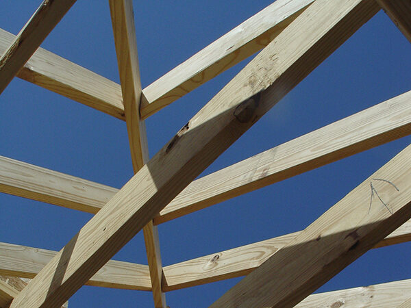 Wood Beams Against Blue Sky