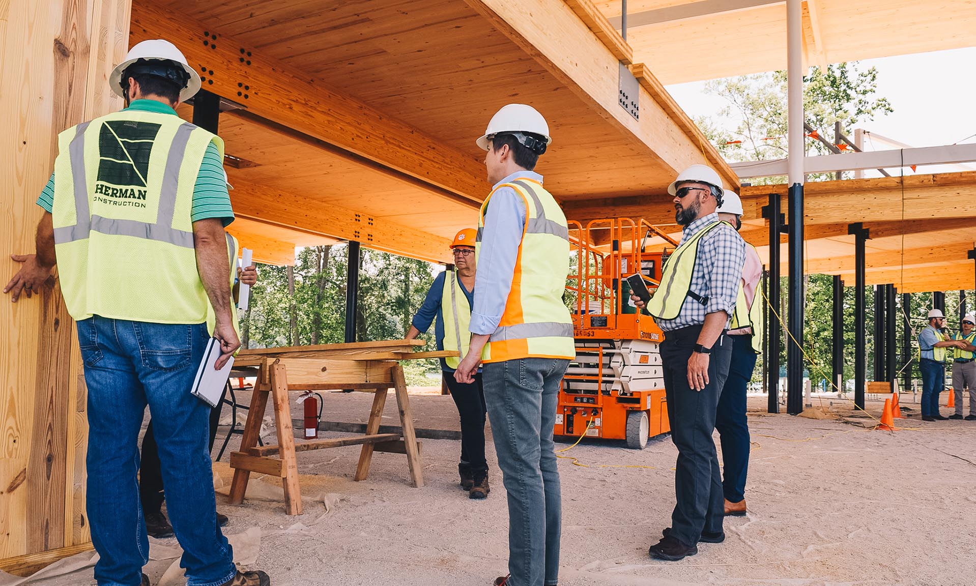 Andy Quattlebaum under construction with workers