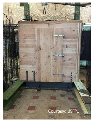 testing storm shelter strength with wind pressure and missile impact