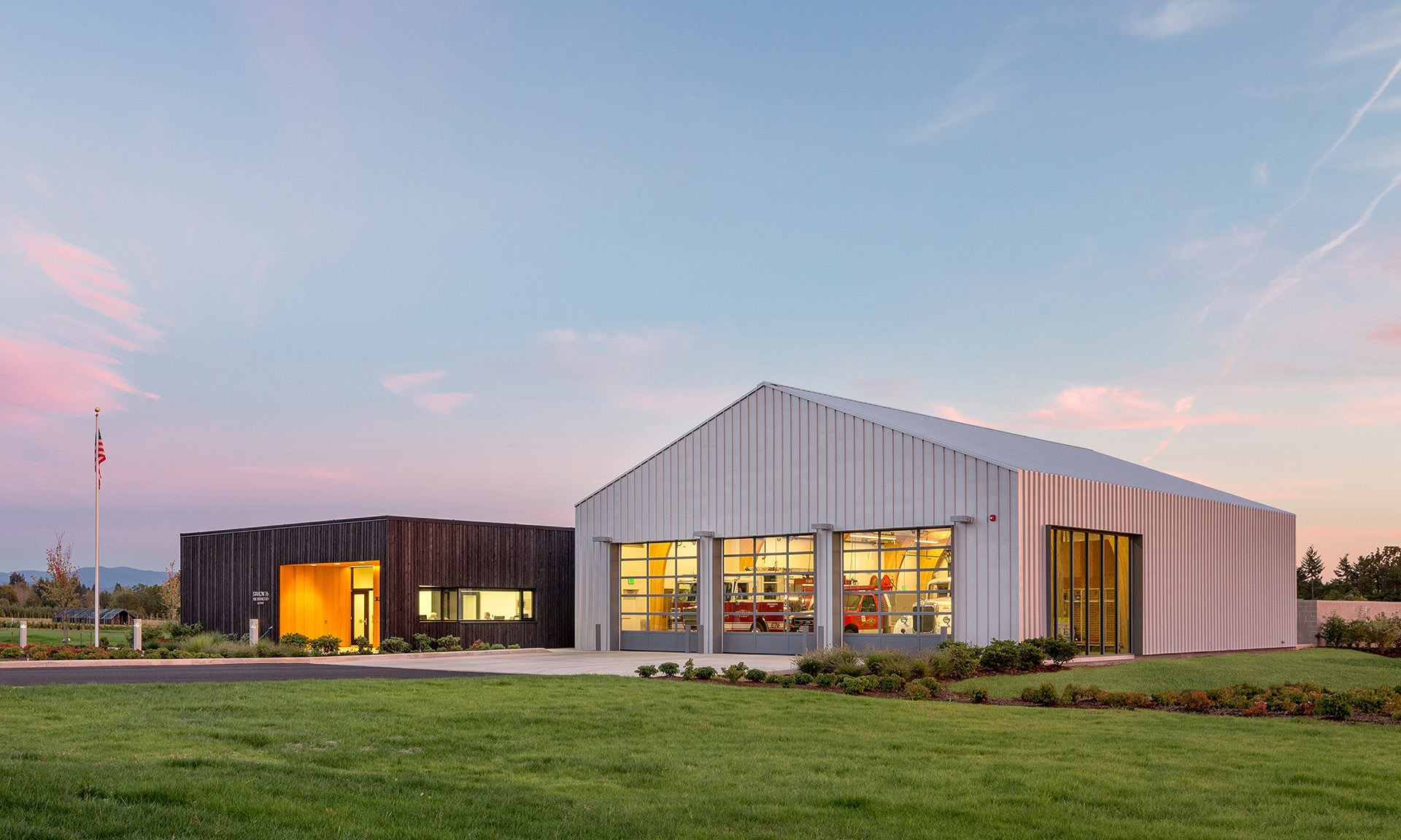 Fire Station 76 exterior at dusk