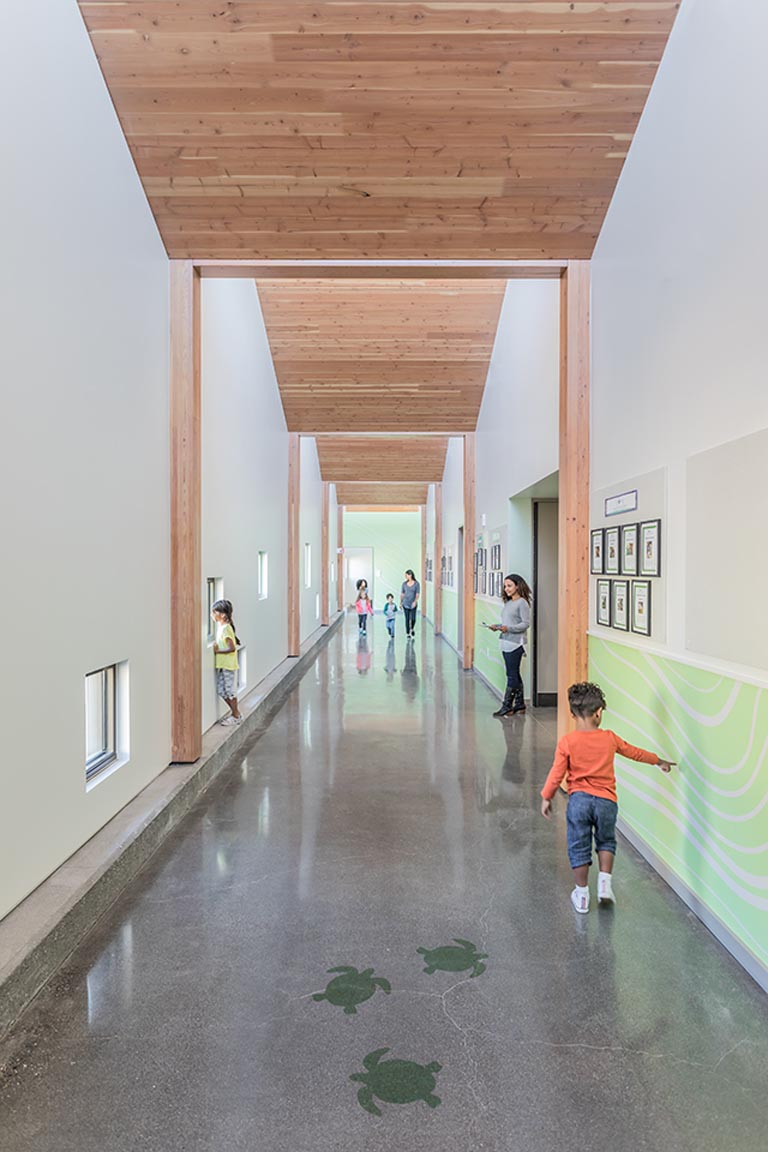 Genentech Child Care Center hallway with children