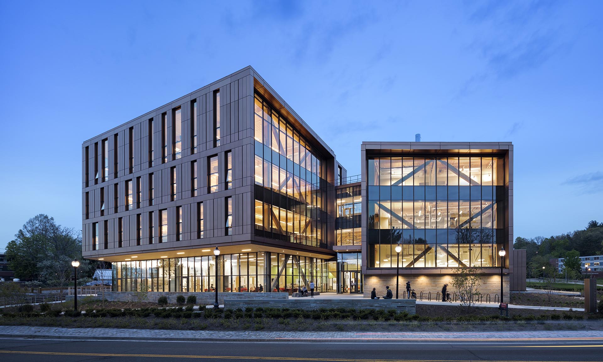 John W. Olver Design Building at UMass Amherst exterior with inside lit up