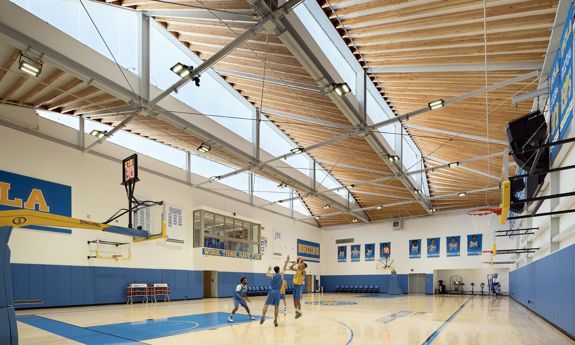 Mo Ostin Basketball Center at UCLA students playing basketball in gym