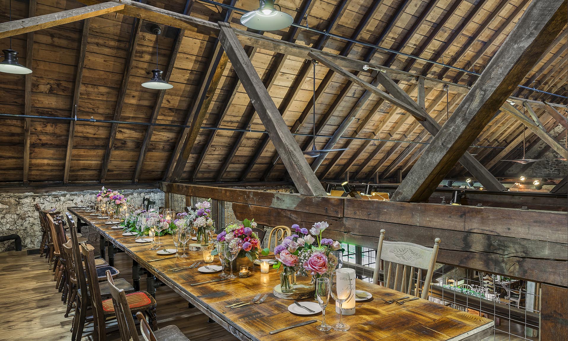 Painter Barn dining space wood beams