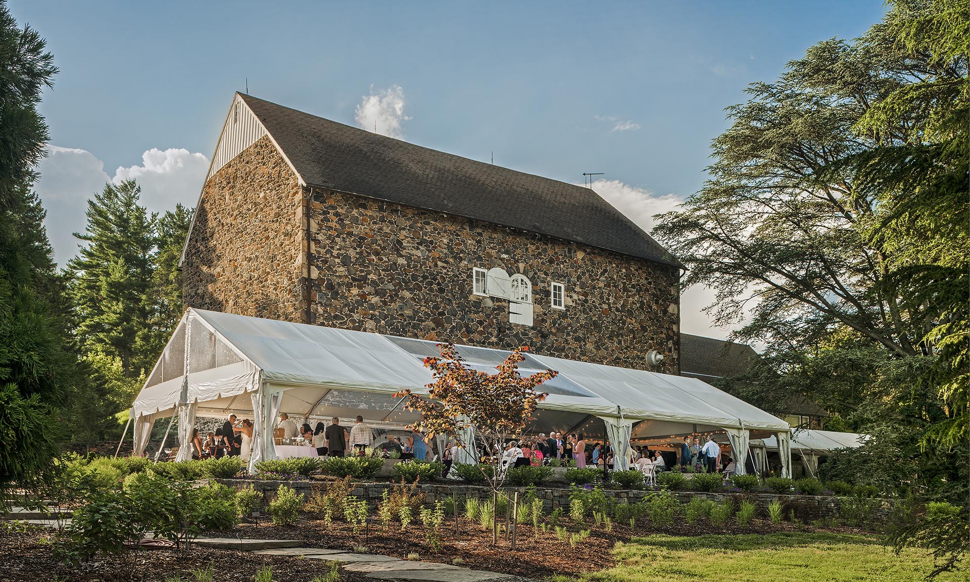 Painter Barn exterior with tent