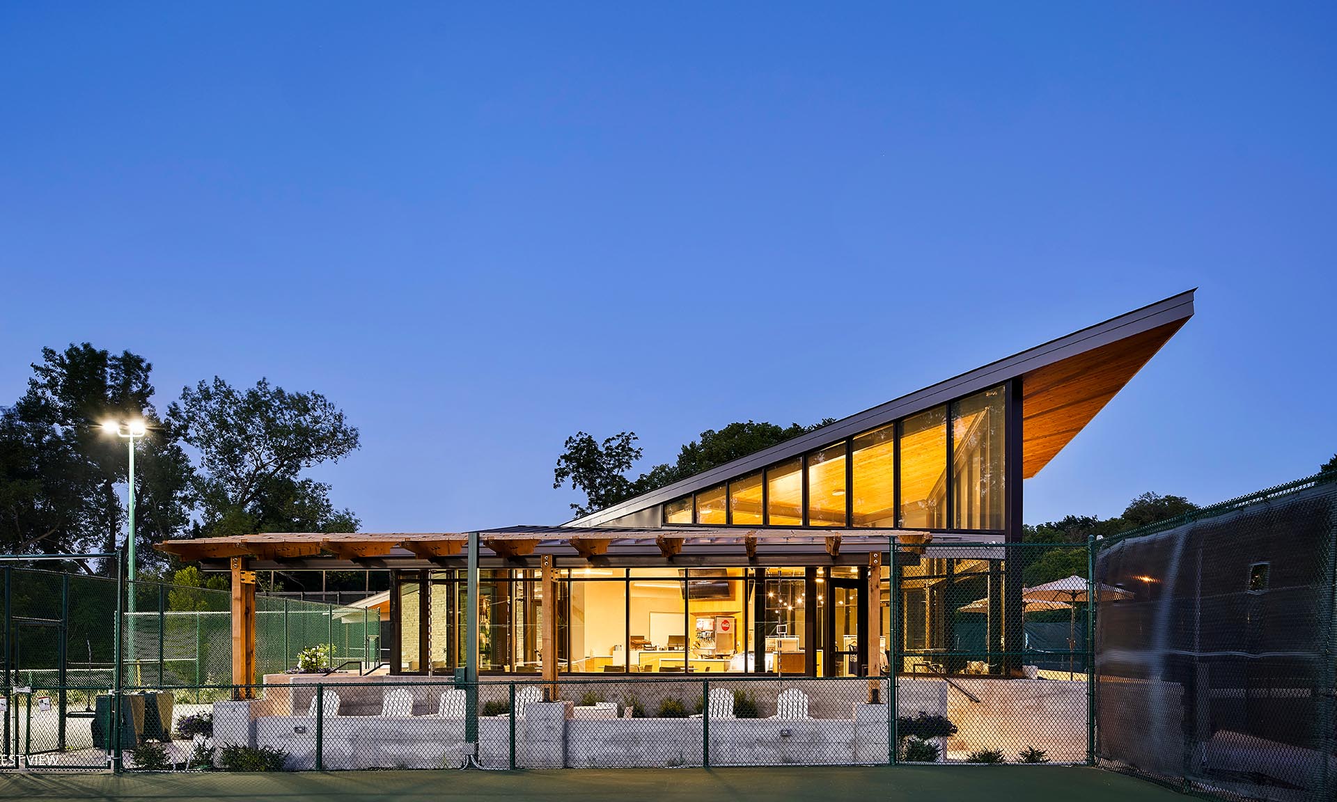 Tennis Pavilion exterior lit up